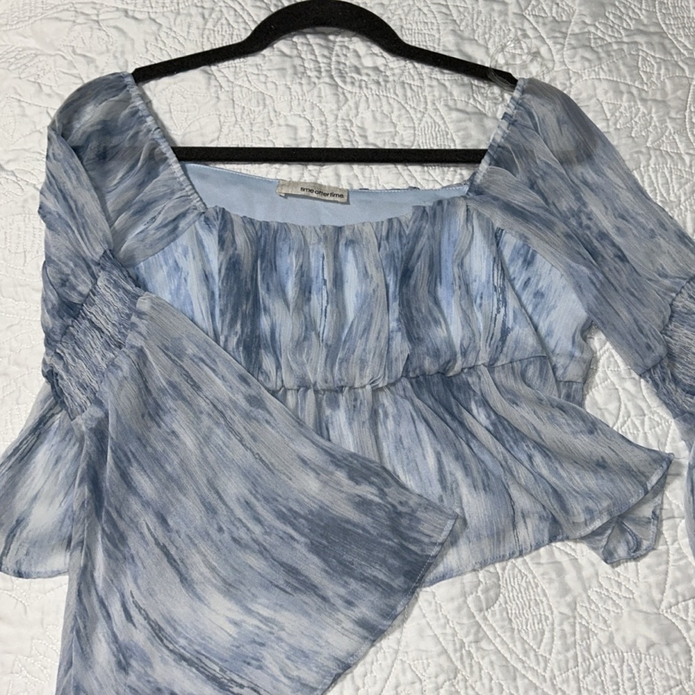 Cropped blue bell sleeve top